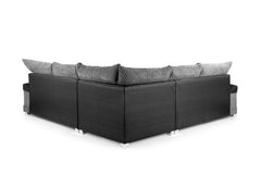 Rear view of corner sofa with dark upholstered back panels and gray cushions