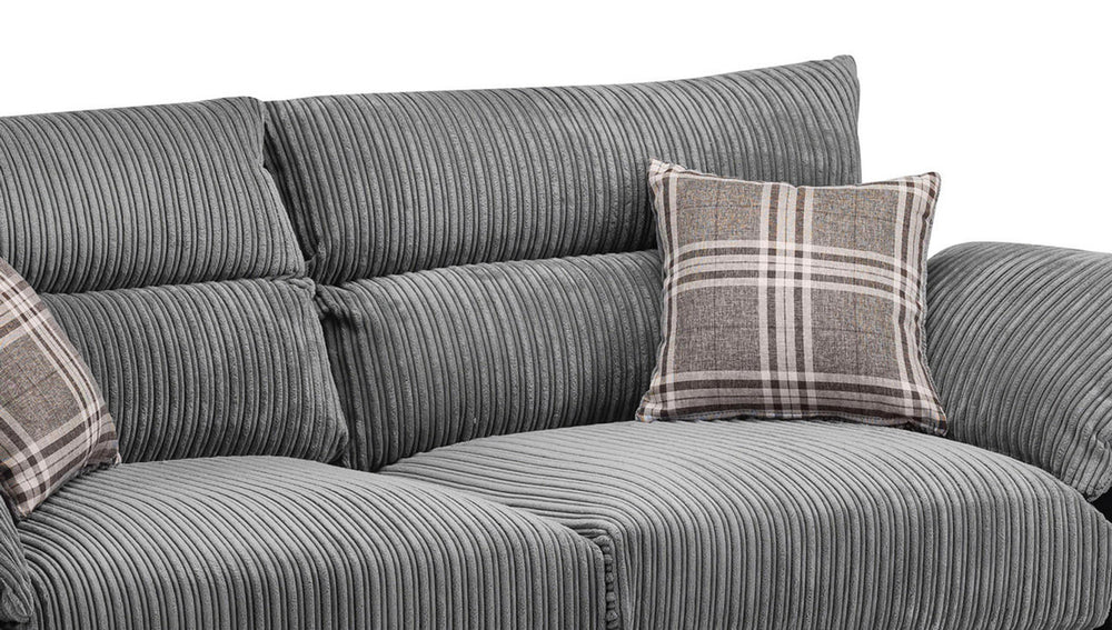 Ribbed gray sofa seat and back cushions with a plaid accent pillow