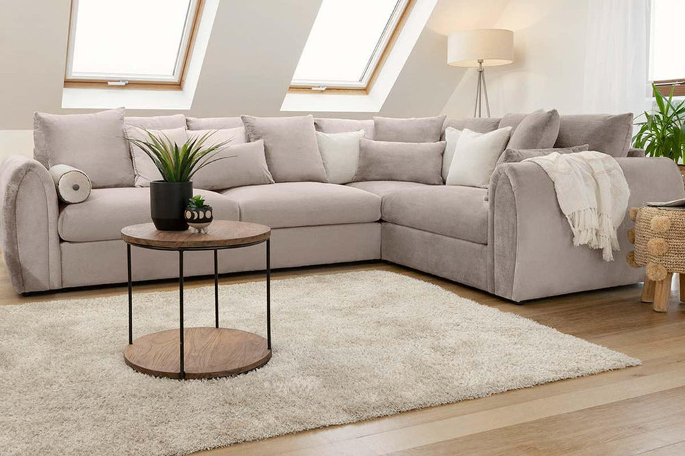 Mirabel right-corner sofa with loose scatter cushions and a chaise-style end