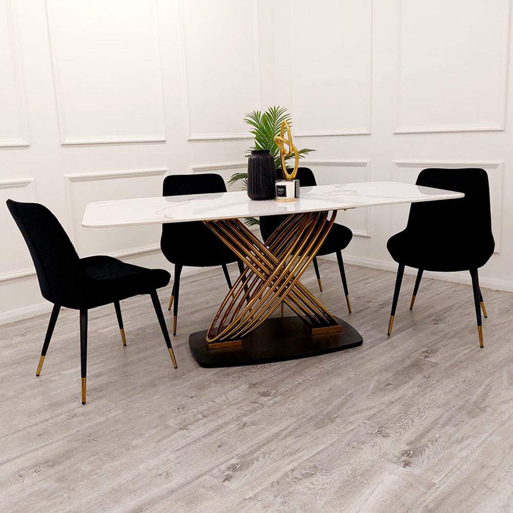 Orion Gold dining table with white veined stone top and sculptural gold-tone base
