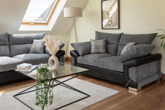 Logan Fullback sofa with gray ribbed upholstery, dark arms, and plaid cushions