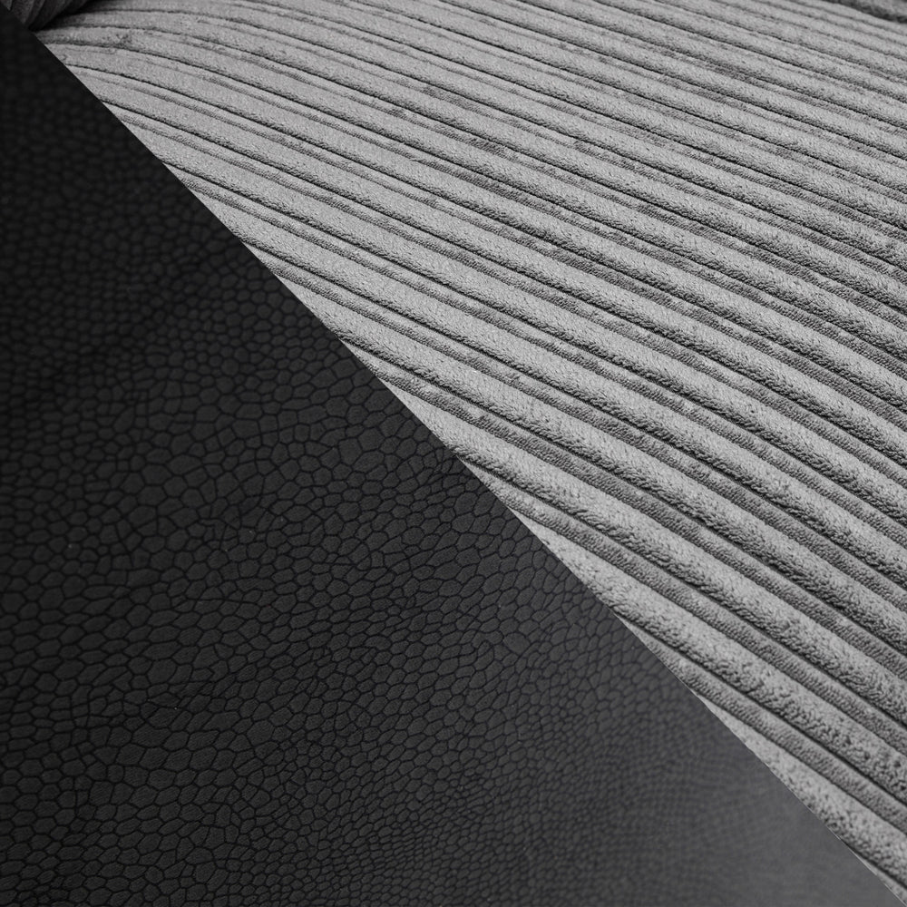 Logan Fullback sofa upholstery detail showing gray ribbed fabric and dark textured material