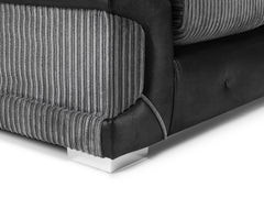 Logan Fullback sofa detail of gray ribbed fabric, dark trim, and metal foot