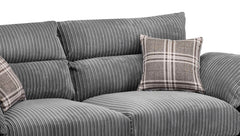 Logan Fullback sofa close-up with gray ribbed cushions and plaid throw pillow