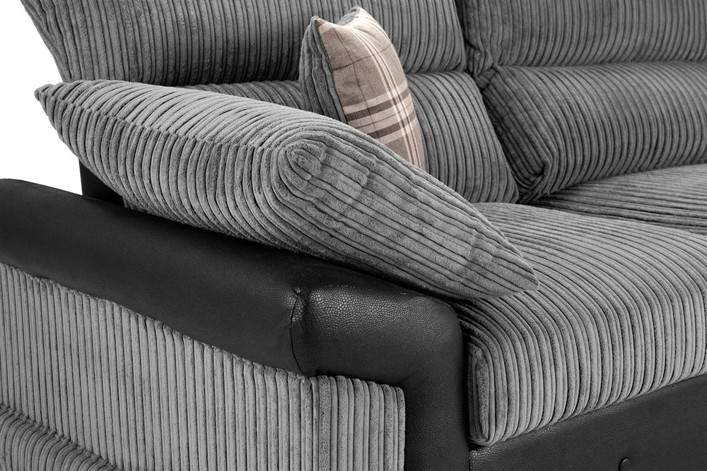 Logan Fullback sofa detail of ribbed gray cushions, dark arm, and plaid pillow